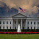 The White House with a stormy sky above.