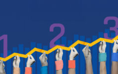 Many hand hold up a line of a chart that is gradually rising, with the numbers 1, 2, 3 in purple resting on the line